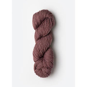 a hank of Blue Sky Fibers 50g Woolstk yarn in Lilac Bloom
