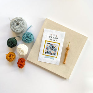 Punch needle kit with yarn and canvas