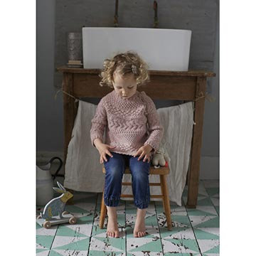 Child wearing the Hygge Baby sweater from Loop London