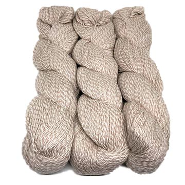 hanks of Illimani Sabri yarn in Marzipan