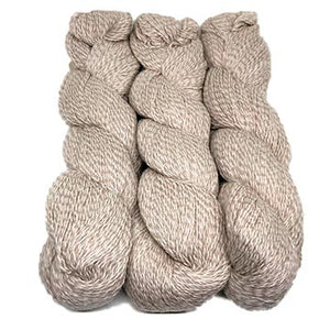 hanks of Illimani Sabri yarn in Marzipan