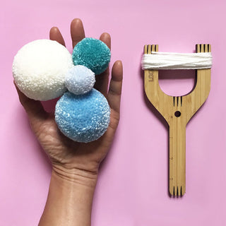 Loome tool with pom poms