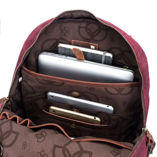 Della Q Makers Backpack an inside peak showing laptop holder