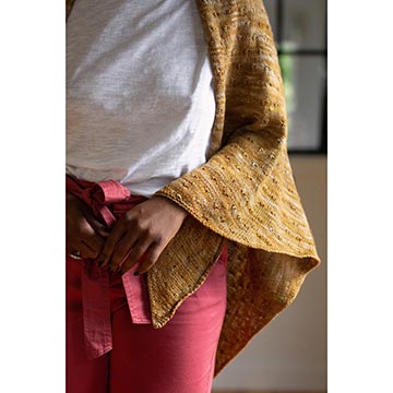 woman wearing the Matilija shawl in Manos Fino