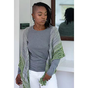Woman wearing the Romneya shawl in Manos Fino