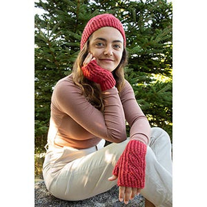 Woman wearing hat and and fingerless mitts