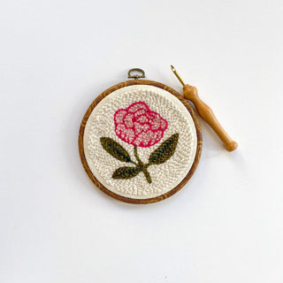 Completed Peony Punch needle kit in embroidery hoop
