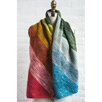 front image of rainbow crochet scarf from Manos del Uruguay