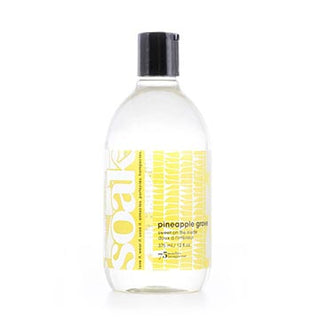 a bottle of Soak wash in Pineapple Grove scent