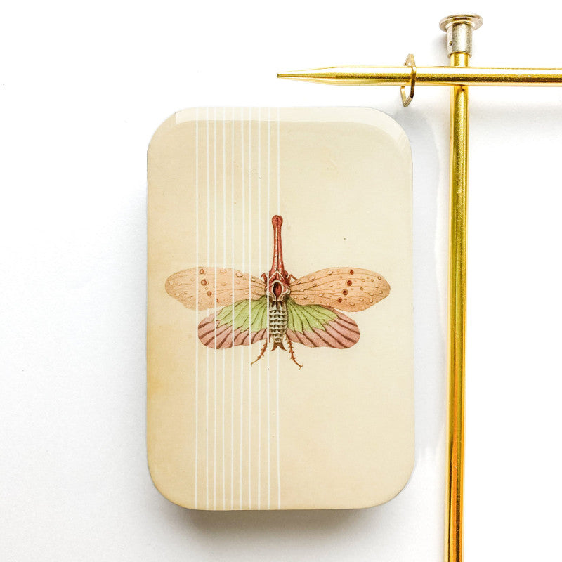 resin tin with vintage moth image