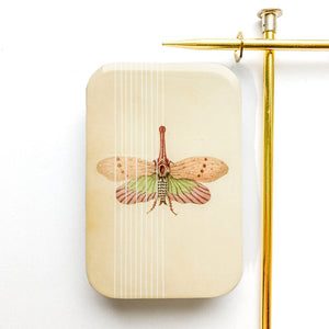 resin tin with vintage moth image