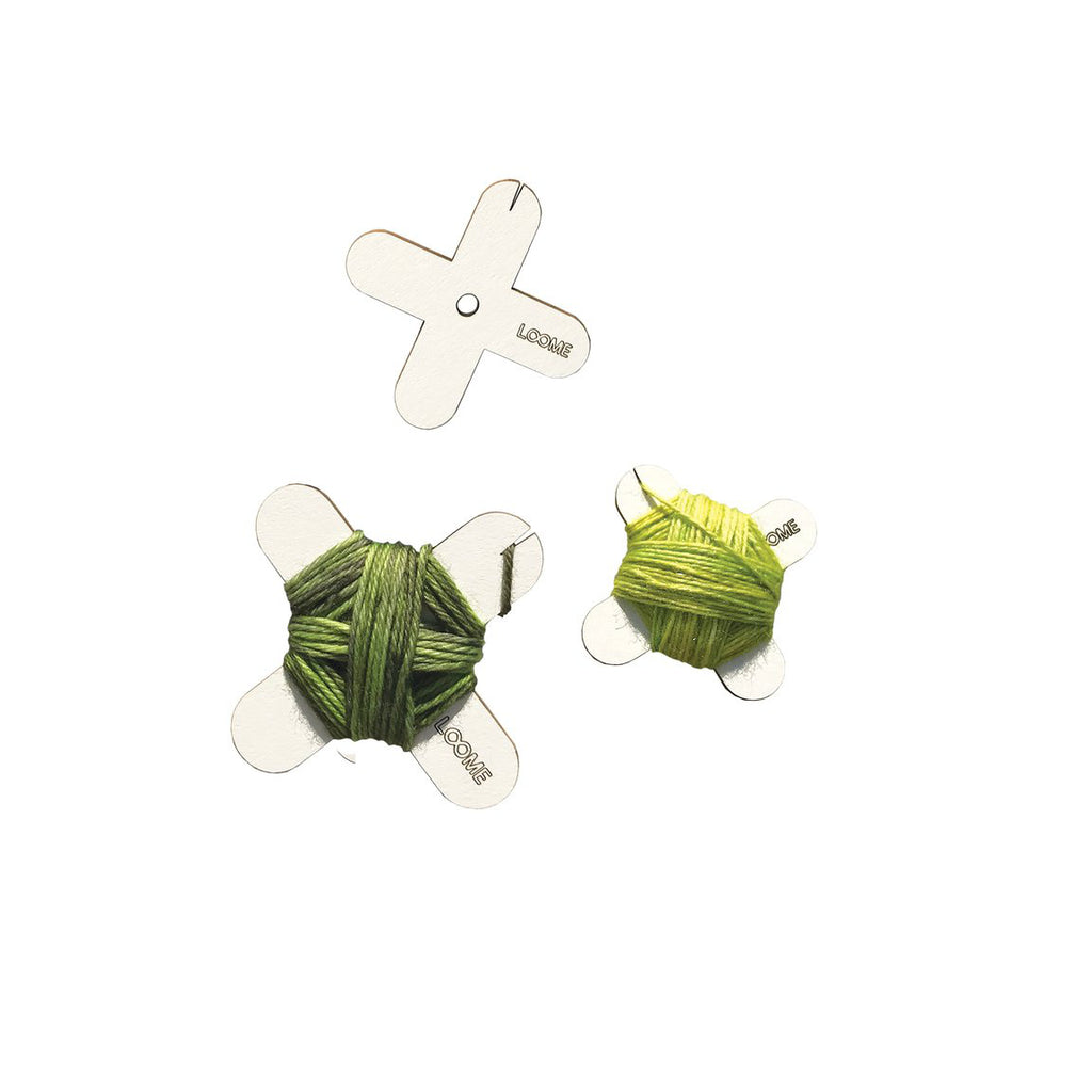 Paper Yarn bobbins with yarn bits