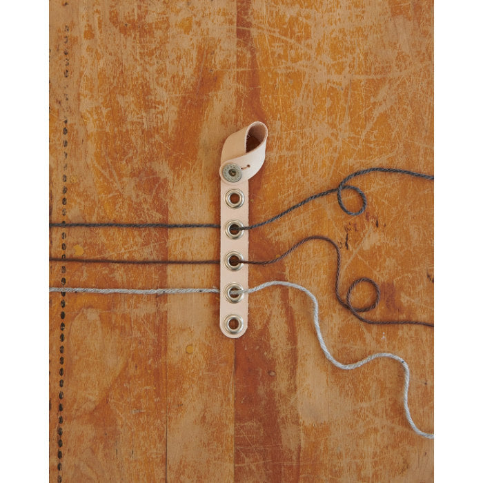 knitting yarn tender using multiple strands of yarn