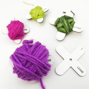 Yarn bobbins from Loome with bulky and thin yarn