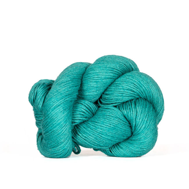 a hank of Kelbourne Wollens Mojave cotton linen yarn in turquoise
